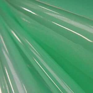 Nærbillede af Vakuumfilm 120 °C, der har en glat, skinnende overflade med lysegrønne nuancer og diagonale reflekterende linjer, der giver et blankt, abstrakt look.
